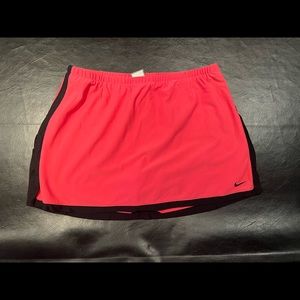 Nike Women’s Tennis Skort. Pink with black trim. Medium